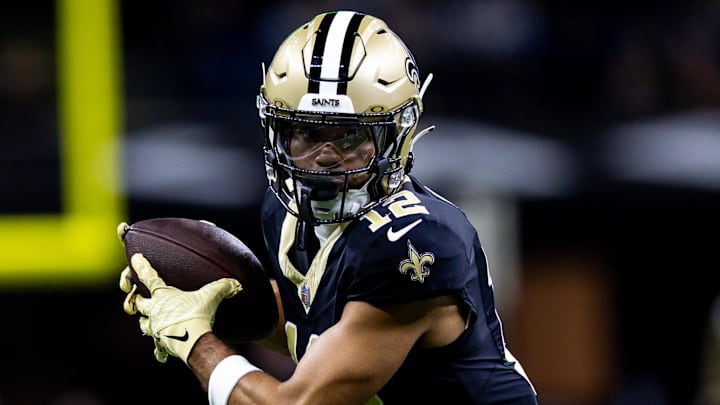 Dec 3, 2023; New Orleans, Louisiana, USA; New Orleans Saints wide receiver Chris Olave (12) catches a pass against the Detroit Lions during the first half at the Caesars Superdome. Mandatory Credit: Stephen Lew-Imagn Images Dec 3, 2023; New Orleans, Louisiana, USA; New Orleans Saints wide receiver Chris Olave (12) catches a pass against the Detroit Lions during the first half at the Caesars Superdome. Mandatory Credit: Stephen Lew-Imagn Images