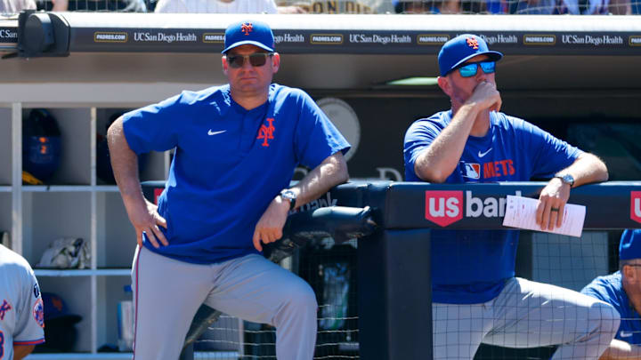Jul 30, 2025; San Diego, California, USA; New York Mets manager Carlos Mendoza (64) watches play during the seventh inning against the San Diego Padres at Petco Park. Jul 30, 2025; San Diego, California, USA; New York Mets manager Carlos Mendoza (64) watches play during the seventh inning against the San Diego Padres at Petco Park.