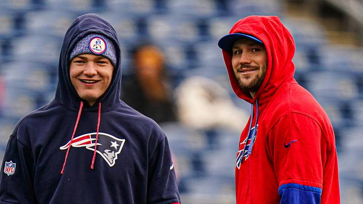 Jan 5, 2025; Foxborough, Massachusetts, USA; Buffalo Bills quarterback Josh Allen (17) and New England Patriots quarterback Drake Maye (10) talk on the field before the start of the game at Gillette Stadium. Mandatory Credit: David Butler II-Imagn Images