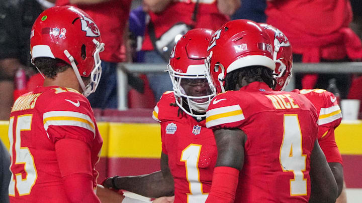 Sep 5, 2024; Kansas City, Missouri, USA; Kansas City Chiefs wide receiver Xavier Worthy (1) celebrates with quarterback Patrick Mahomes (15) and wide receiver Rashee Rice (4) after scoring a touchdown against the Baltimore Ravens during the game at GEHA Field at Arrowhead Stadium. Mandatory Credit: Denny Medley-Imagn Images
