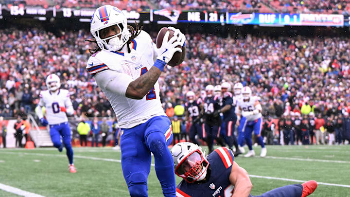 Buffalo Bills running back James Cook III scores a touchdown against the New England Patriots. Buffalo Bills running back James Cook III scores a touchdown against the New England Patriots.