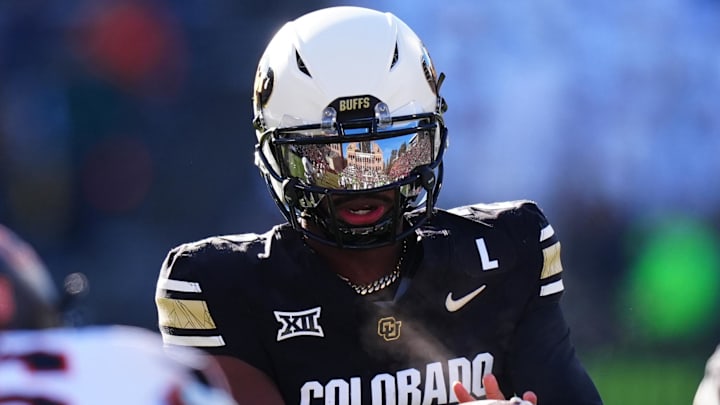 Nov 29, 2024; Boulder, Colorado, USA; Colorado Buffaloes quarterback Shedeur Sanders (2) takes a hike in the first quarter against the Oklahoma State Cowboys at Folsom Field. Mandatory Credit: Ron Chenoy-Imagn Images Nov 29, 2024; Boulder, Colorado, USA; Colorado Buffaloes quarterback Shedeur Sanders (2) takes a hike in the first quarter against the Oklahoma State Cowboys at Folsom Field. Mandatory Credit: Ron Chenoy-Imagn Images
