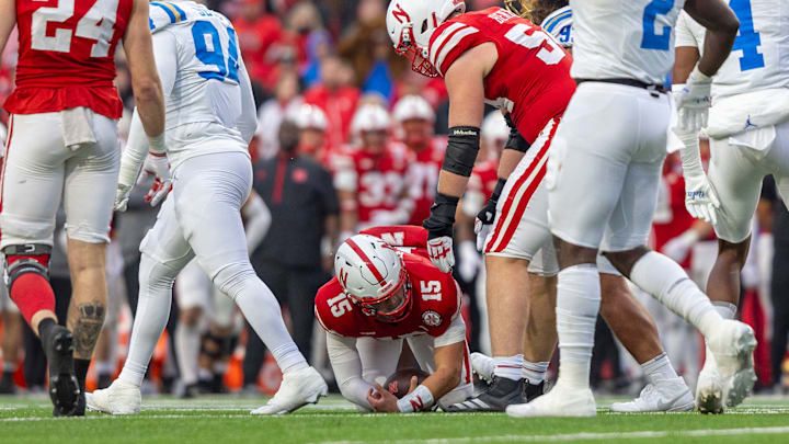 Nebraska quarterback Dylan Raiola is helped up by offensive lineman Bryce Benhart after being sacked for a 10-yard loss on 4th-and-5 by UCLA. Nebraska quarterback Dylan Raiola is helped up by offensive lineman Bryce Benhart after being sacked for a 10-yard loss on 4th-and-5 by UCLA.
