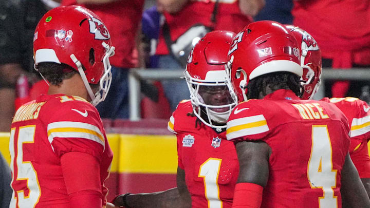 Sep 5, 2024; Kansas City, Missouri, USA; Kansas City Chiefs wide receiver Xavier Worthy (1) celebrates with quarterback Patrick Mahomes (15) and wide receiver Rashee Rice (4) after scoring a touchdown against the Baltimore Ravens during the game at GEHA Field at Arrowhead Stadium. Mandatory Credit: Denny Medley-Imagn Images