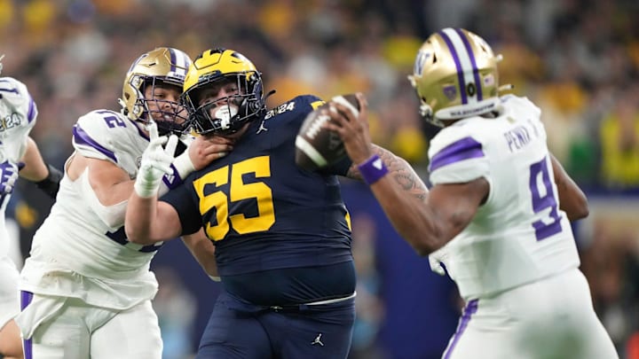 Michigan defensive lineman Mason Graham looks to tackle Washington quarterback Michael Penix Jr. during the second half of U-M's 34-13 win in the College Football Playoff national championship game in Houston on Monday, Jan. 8, 2024. Michigan defensive lineman Mason Graham looks to tackle Washington quarterback Michael Penix Jr. during the second half of U-M's 34-13 win in the College Football Playoff national championship game in Houston on Monday, Jan. 8, 2024.