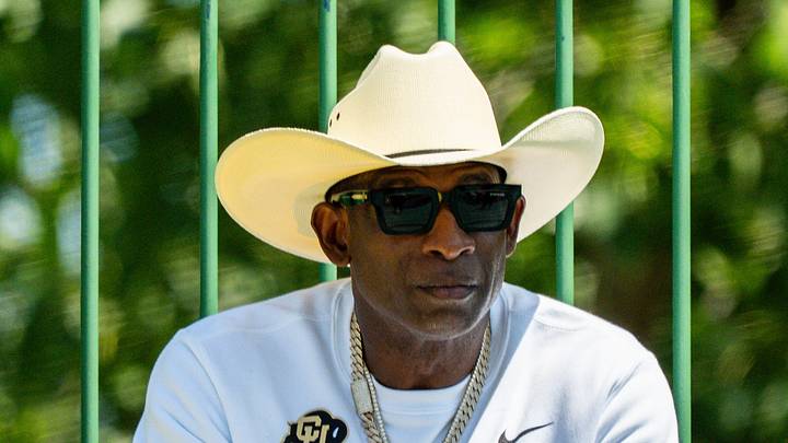 Deion Sanders takes in the second day of Cleveland Browns training camp, July 30, 2026, in Berea, Ohio. Deion Sanders takes in the second day of Cleveland Browns training camp, July 30, 2026, in Berea, Ohio.