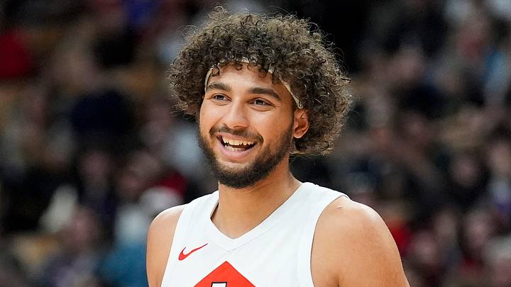 Oct 13, 2026; Toronto, Ontario, CAN;  Toronto Raptors forward Allen Graves (22) smiles during a break in the action against the New York Knicks during the first half at Scotiabank Arena.  Mandatory Credit: John E. Sokolowski-Imagn Images