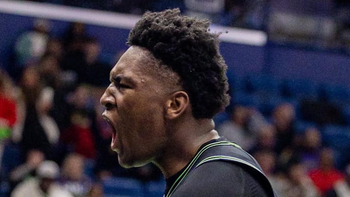 Dec 8, 2025; New Orleans, Louisiana, USA;  New Orleans Pelicans center Derik Queen (22) reacts to a play against the San Antonio Spurs during the second half at Smoothie King Center. Mandatory Credit: Stephen Lew-Imagn Images
