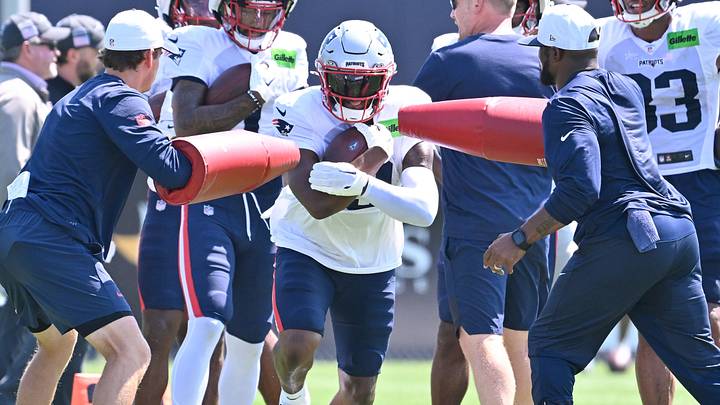 Jul 28, 2025; Foxborough, MA, USA; New England Patriots wide receiver Kayshon Boutte (9) works with coaching staff during training camp at Gillette Stadium. Mandatory Credit: Eric Canha-Imagn Images Jul 28, 2025; Foxborough, MA, USA; New England Patriots wide receiver Kayshon Boutte (9) works with coaching staff during training camp at Gillette Stadium. Mandatory Credit: Eric Canha-Imagn Images