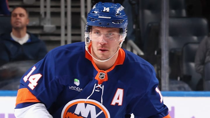 The New York Islanders trade with the Canucks set off a sequence of events that landed Axel Sandin-Pellikka with the Detroit Red Wings.