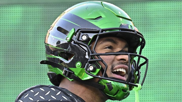 Nov 22, 2025; Eugene, Oregon, USA; Oregon Ducks tight end Kenyon Sadiq (18) celebrates scoring a touch down during the first half against the Southern California Trojans at Autzen Stadium. Mandatory Credit: Troy Wayrynen-Imagn Images
