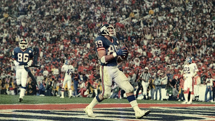 Jan 25, 1987; Pasadena, CA, USA; FILE PHOTO; New York Giants tight end Mark Bavaro (89) celebrates after scoring a touchdown against the Denver Broncos during Super Bowl XXI at the Rose Bowl. The Giants defeated the Broncos 39-20. Jan 25, 1987; Pasadena, CA, USA; FILE PHOTO; New York Giants tight end Mark Bavaro (89) celebrates after scoring a touchdown against the Denver Broncos during Super Bowl XXI at the Rose Bowl. The Giants defeated the Broncos 39-20.
