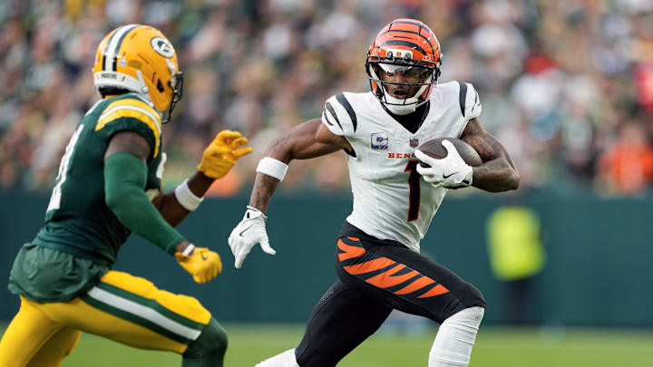 Oct 12, 2025; Green Bay, Wisconsin, USA; Cincinnati Bengals wide receiver Ja'Marr Chase (1) rushes with the football after catching a pass during the third quarter against the Green Bay Packers at Lambeau Field. Mandatory Credit: Jeff Hanisch-Imagn Images Oct 12, 2025; Green Bay, Wisconsin, USA; Cincinnati Bengals wide receiver Ja'Marr Chase (1) rushes with the football after catching a pass during the third quarter against the Green Bay Packers at Lambeau Field. Mandatory Credit: Jeff Hanisch-Imagn Images