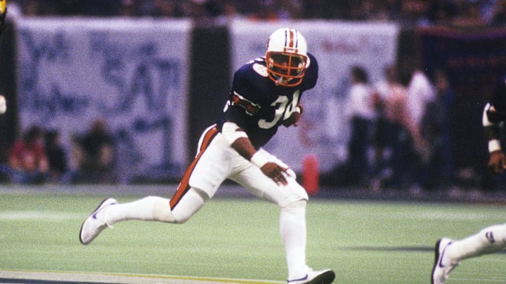 Auburn Tigers running back Bo Jackson carries the ball against the Michigan Wolverines during the 1984 Sugar Bowl. He was named MVP of the game. Auburn Tigers running back Bo Jackson carries the ball against the Michigan Wolverines during the 1984 Sugar Bowl. He was named MVP of the game.
