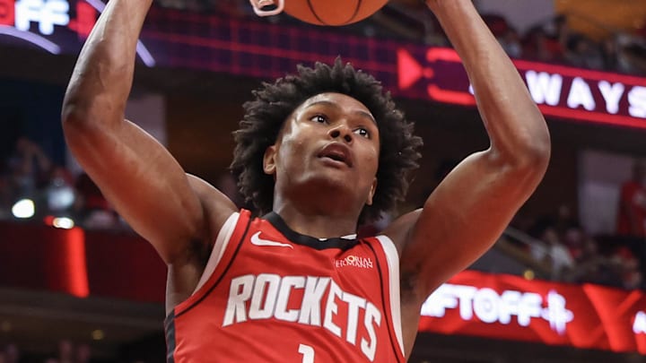 Apr 30, 2025; Houston, Texas, USA; Houston Rockets forward Amen Thompson (1) dunks against the Golden State Warriors in the fourth quarter during game five of first round for the 2025 NBA Playoffs at Toyota Center. Mandatory Credit: Thomas Shea-Imagn Images