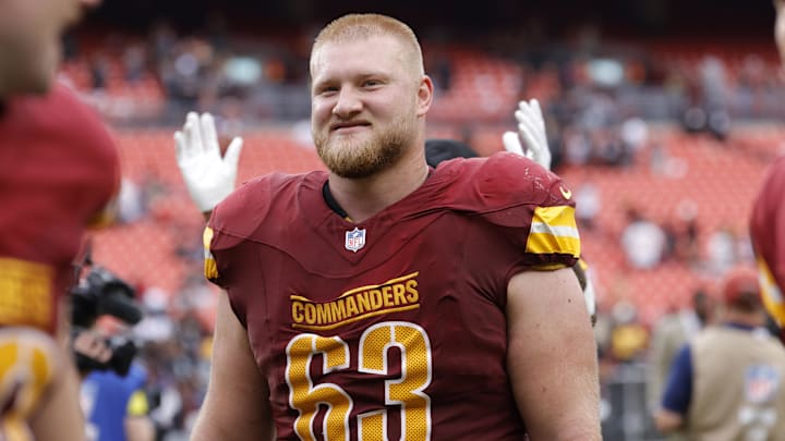 Tyler Biadasz walks off field following win.