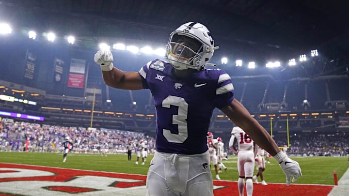 Kansas State running back Dylan Edwards (3) celebrates the go-ahead touchdown against Rutgers during the second half of the Rate Bowl at Chase Field on Dec. 26, 2024, in Phoenix.