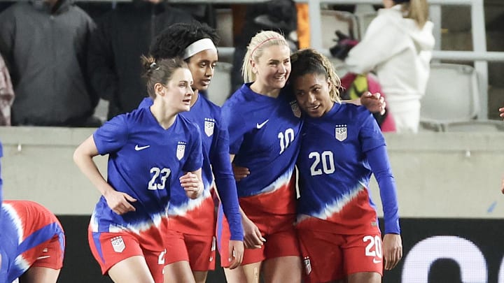 USA forward Catarina Macario (20) celebrates her goal with teammates against Colombia in the first half at Shell Energy Stadium.