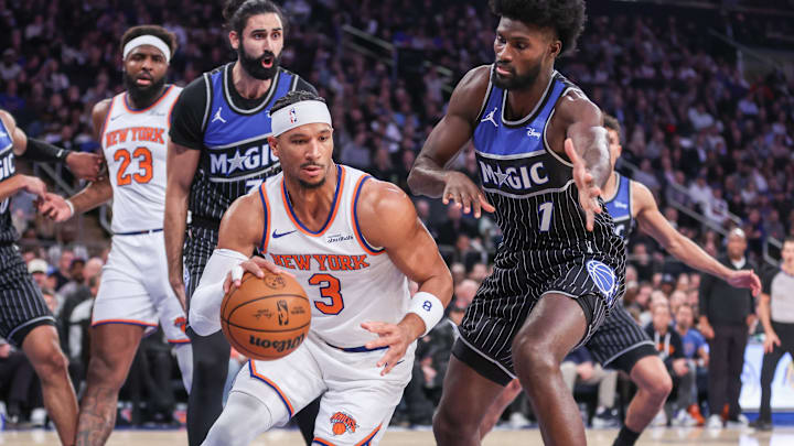 Nov 12, 2025; New York, New York, USA;  New York Knicks guard Josh Hart (3) looks to drive past Orlando Magic forward Jonathan Isaac (1) in the first quarter at Madison Square Garden. Mandatory Credit: Wendell Cruz-Imagn Images