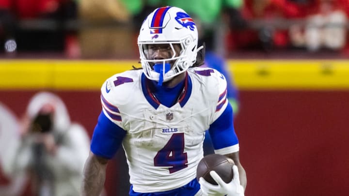 Jan 26, 2025; Kansas City, MO, USA; Buffalo Bills running back James Cook (4) against the Kansas City Chiefs during the AFC Championship game at GEHA Field at Arrowhead Stadium. Mandatory Credit: Mark J. Rebilas-Imagn Images
