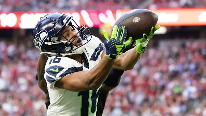 Dec 8, 2024; Glendale, Arizona, USA; Seattle Seahawks wide receiver Tyler Lockett (16) against the Arizona Cardinals at State Farm Stadium.