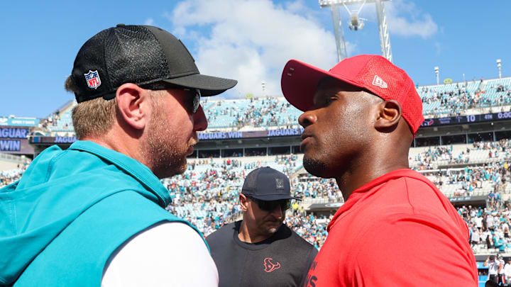 Sep 21, 2025; Jacksonville, Florida, USA; Jacksonville Jaguars head coach Liam Coen and Houston Texans head coach DeMeco Ryans shake hands after the game at EverBank Stadium. Mandatory Credit: Morgan Tencza-Imagn Images