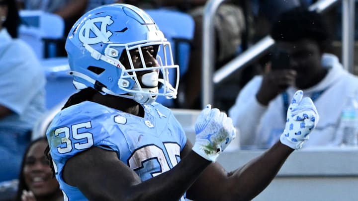 Sep 13, 2025; Chapel Hill, North Carolina, USA; North Carolina Tar Heels running back Demon June (35) celebrates after scoring a touchdown in the fourth quarter at Kenan Stadium. Mandatory Credit: Bob Donnan-Imagn Images