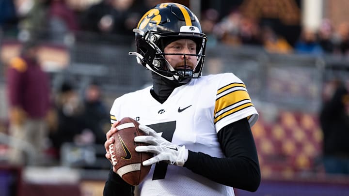 Nov 19, 2022; Minneapolis, Minnesota, USA; Iowa Hawkeyes quarterback Spencer Petras (7) warms up before the game against the Minnesota Golden Gophers at Huntington Bank Stadium. Mandatory Credit: Matt Krohn-Imagn Images