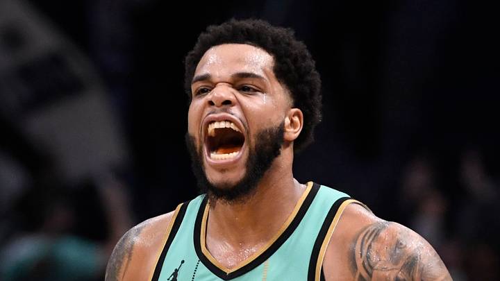 Charlotte, North Carolina, USA;  Charlotte Hornets forward Miles Bridges (0) reacts after scoring during the second half against the Chicago Bulls at the Spectrum Center on Dec 30, 2024.
