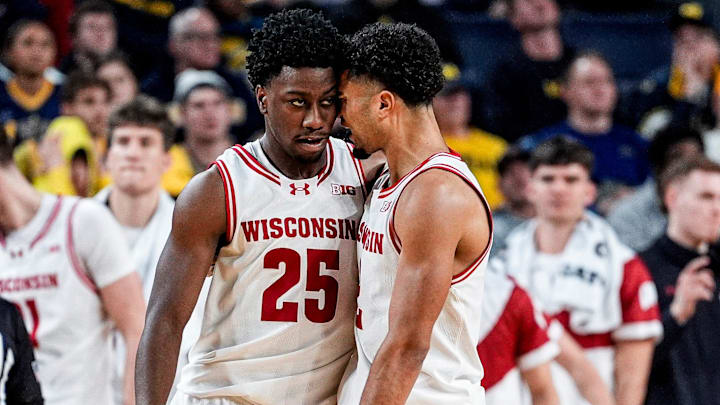 Wisconsin guard John Blackwell (25), left, celebrates a play against Michigan with guard Nick Boyd (2) during the second half at Crisler Center in Ann Arbor on Saturday, Jan. 10, 2026.