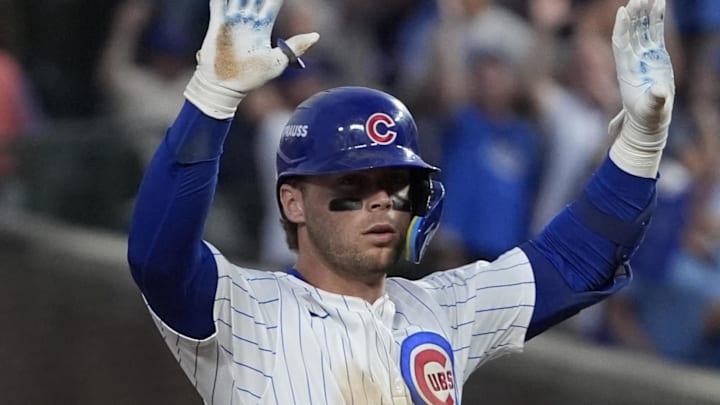 Oct 2, 2025; Chicago, Illinois, USA; Chicago Cubs second base Nico Hoerner (2) celebrates his double against the San Diego Padres during game three of the Wildcard round for the 2025 MLB playoffs at Wrigley Field. Mandatory Credit: David Banks-Imagn Images