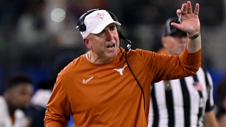 Jan 10, 2025; Arlington, TX, USA; Texas Longhorns offensive coordinator Kyle Flood during the game between the Texas Longhorns and the Ohio State Buckeyes at AT&T Stadium. Mandatory Credit: Jerome Miron-Imagn Images