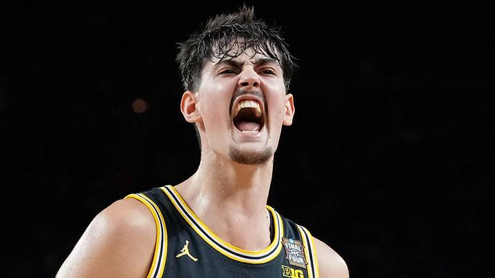 Michigan Wolverines center Aday Mara (15) reacts after a play against the Arizona Wildcats during Final Four of the 2026 NCAA Tournament at Lucas Oil Stadium on April 4, 2026.