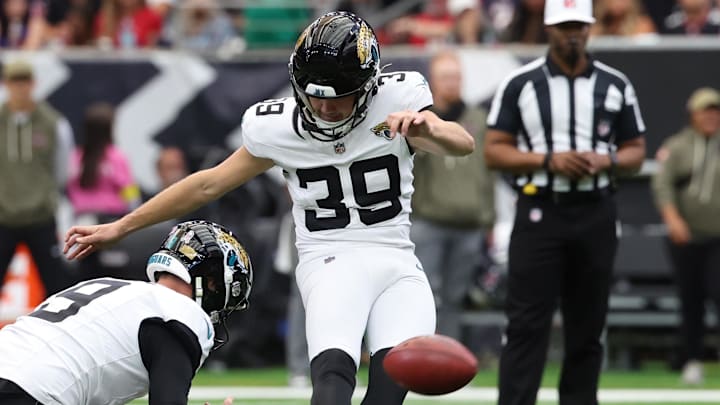 Jacksonville Jaguars place kicker Cam Little (39) kicks a field goal against the Houston Texans during the first half at NRG Stadium.