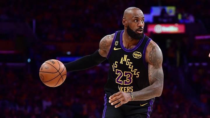 May 11, 2026; Los Angeles, California, USA; Los Angeles Lakers forward LeBron James (23) moves the ball against Oklahoma City Thunder guard Alex Caruso (9) during the first half in game four of the second round of the 2026 NBA Playoffs at Crypto.com Arena. Mandatory Credit: Gary A. Vasquez-Imagn Images