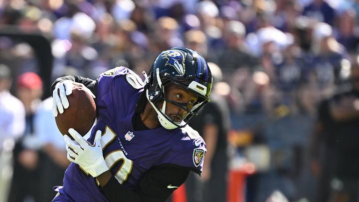 Oct 5, 2025; Baltimore, Maryland, USA; Baltimore Ravens wide receiver Deandre Hopkins (10) runs for a gain during the first quarter against the Houston Texans at M&T Bank Stadium. Mandatory Credit: Rafael Suanes-Imagn Images