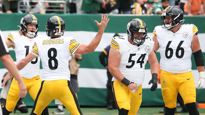 Pittsburgh Steelers wide receiver Ben Skowronek (15) celebrates a touchdown with quarterback Aaron Rodgers (8) 