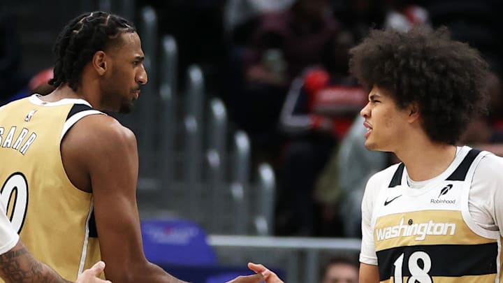 Jan 29, 2026; Washington, District of Columbia, USA; Washington Wizards forward Kyshawn George (18) celebrates with center Alex Sarr (20) during the first half against the Milwaukee Bucks at Capital One Arena. Mandatory Credit: Daniel Kucin Jr.-Imagn Images