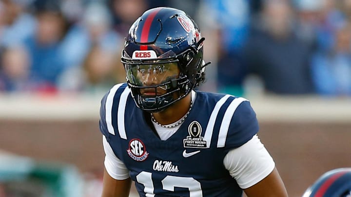 Ole Miss Rebels quarterback Austin Simmons (13) waits for the snap during the second quarter against the Tulane Green Wave at Vaught-Hemingway Stadium in Oxford, Miss.