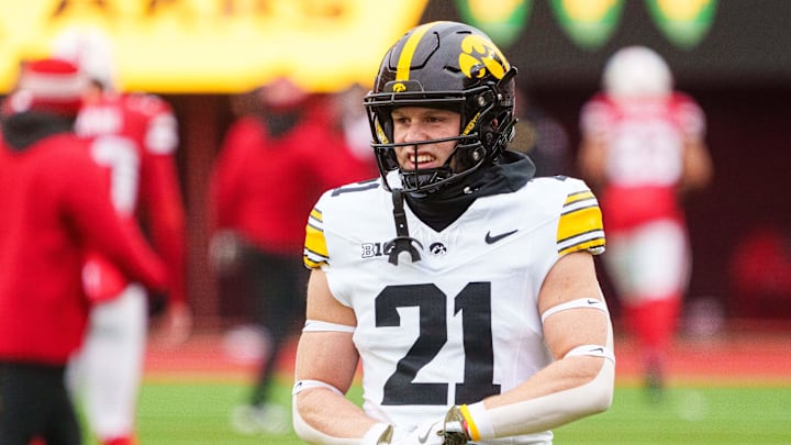 Nov 28, 2025; Lincoln, Nebraska, USA; Iowa Hawkeyes wide receiver Kaden Wetjen (21) warms up before the game against the Nebraska Cornhuskers at Memorial Stadium. Mandatory Credit: Dylan Widger-Imagn Images