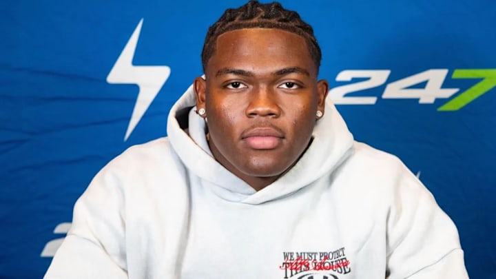 Five-star linebacker Kaden Henderson from Jesuit High School getting his picture taken by Andrew Ivins.