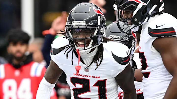 Oct 13, 2024; Foxborough, Massachusetts, USA; Houston Texans safety Calen Bullock (21) celebrates after recovering a fumble against the New England Patriots during the second half at Gillette Stadium. Mandatory Credit: Brian Fluharty-Imagn Images / Brian Fluharty-Imagn Images Oct 13, 2024; Foxborough, Massachusetts, USA; Houston Texans safety Calen Bullock (21) celebrates after recovering a fumble against the New England Patriots during the second half at Gillette Stadium. Mandatory Credit: Brian Fluharty-Imagn Images / Brian Fluharty-Imagn Images