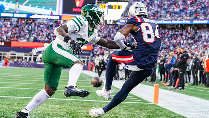 Oct 27, 2024; Foxborough, Massachusetts, USA; New York Jets safety Jalen Mills (35) defends against New England Patriots wide receiver Kendrick Bourne (84) in the second half at Gillette Stadium. Mandatory Credit: David Butler II-Imagn Images