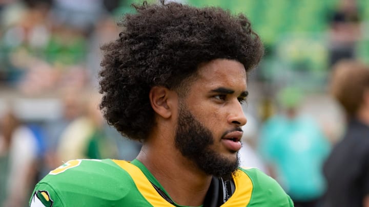 Oregon quarterback Dante Moore warms up as the Oregon Ducks host the Oklahoma State Cowboys on Sept. 6, 2025, at Autzen Stadium in Eugene, Oregon.