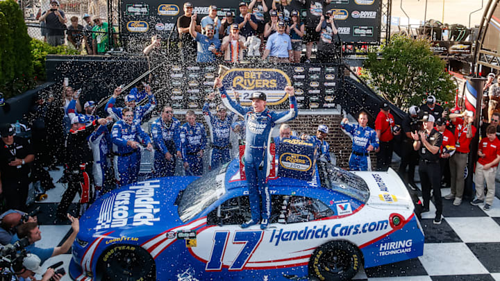 Corey Day celebrates in victory lane after a win in the BetRivers 200 at Dover Motor Speedway.
