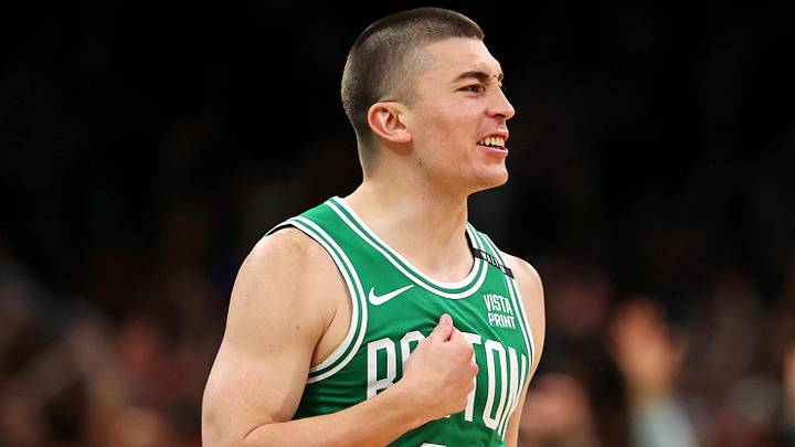 Jun 17, 2024; Boston, Massachusetts, USA; Boston Celtics guard Payton Pritchard (11) celebrates after making a three pointer at the buzzer of halftime against the Dallas Mavericks in game five of the 2024 NBA Finals at TD Garden. Mandatory Credit: Peter Casey-USA TODAY Sports