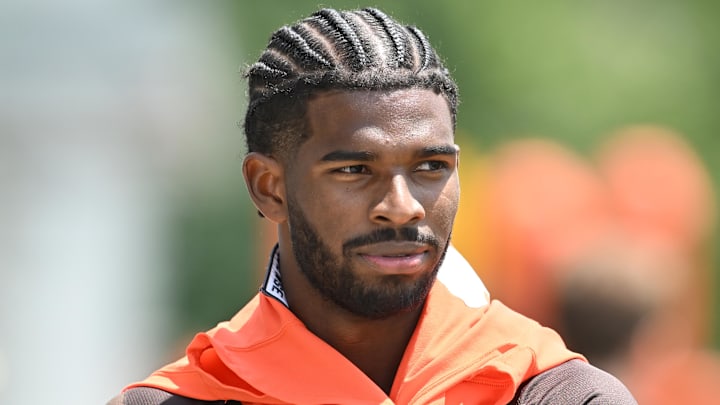 Jun 10, 2025; Berea, OH, USA; Cleveland Browns quarterback Shedeur Sanders (12) walks off the field during minicamp at CrossCountry Mortgage Campus. Mandatory Credit: Ken Blaze-Imagn Images Jun 10, 2025; Berea, OH, USA; Cleveland Browns quarterback Shedeur Sanders (12) walks off the field during minicamp at CrossCountry Mortgage Campus. Mandatory Credit: Ken Blaze-Imagn Images