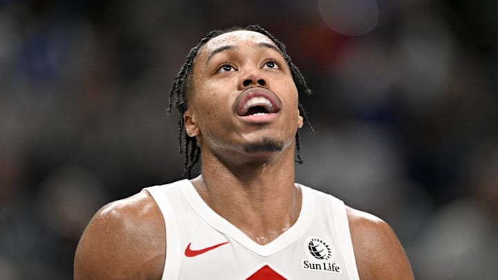 Toronto Raptors forward Scottie Barnes (4) looks on during the second half against the Dallas Mavericks at the American Airlines Center. Toronto Raptors forward Scottie Barnes (4) looks on during the second half against the Dallas Mavericks at the American Airlines Center.