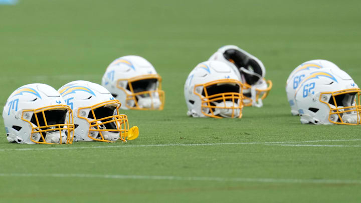 Jun 13, 2023; Costa Mesa, CA, USA; Los Angeles Chargers helmets during minicamp at the Hoag Performance Center. Mandatory Credit: Kirby Lee-Imagn Images Jun 13, 2023; Costa Mesa, CA, USA; Los Angeles Chargers helmets during minicamp at the Hoag Performance Center. Mandatory Credit: Kirby Lee-Imagn Images
