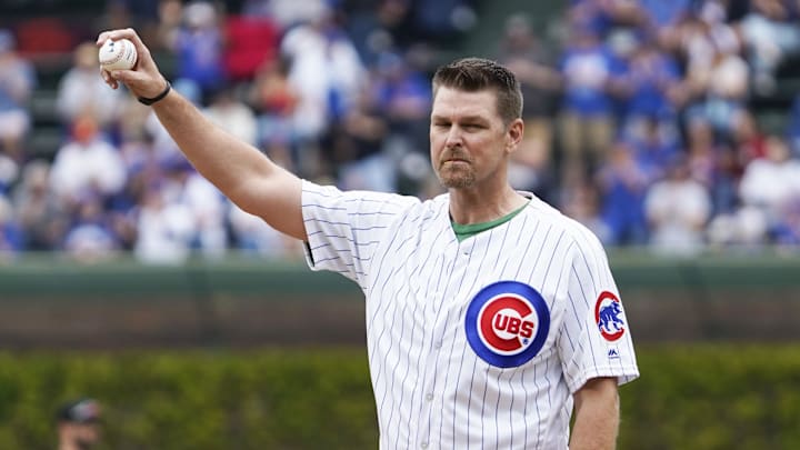 Former Chicago Cubs pitcher Kerry Wood throws out a ceremonial first pitch in his jersey at Wrigley Field
